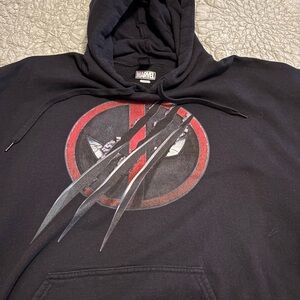 Marvel Deadpool/Wolverine Black Hoodie with Red and Silver Graphics.